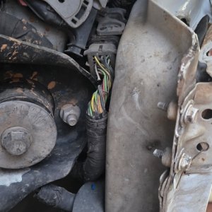 Close-up of engine bay components with the shroud removed