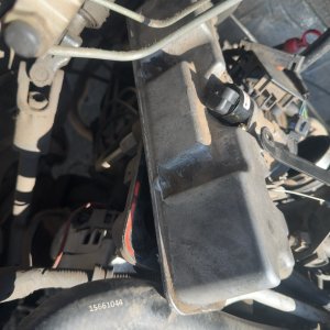 Engine bay component detail during a diesel repair