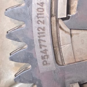 Close inspection of drivetrain gear teeth for wear and damage