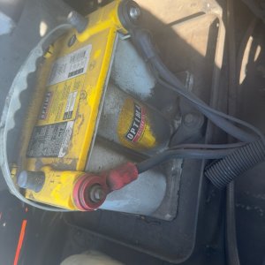 New battery installed in a vehicle during electrical service