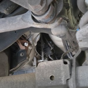 Undercarriage view of steering and suspension components
