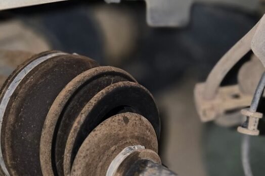 CV axle shaft removed during a front drivetrain repair