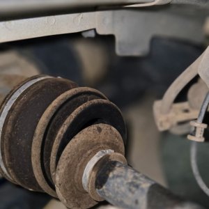 CV axle shaft removed during a front drivetrain repair