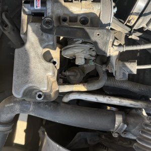 Engine mount and wiring harness detail during an engine repair