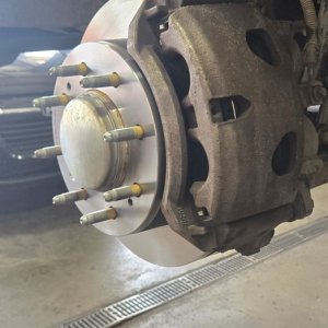 Heavy-duty brake caliper and rotor assembly ready for reassembly