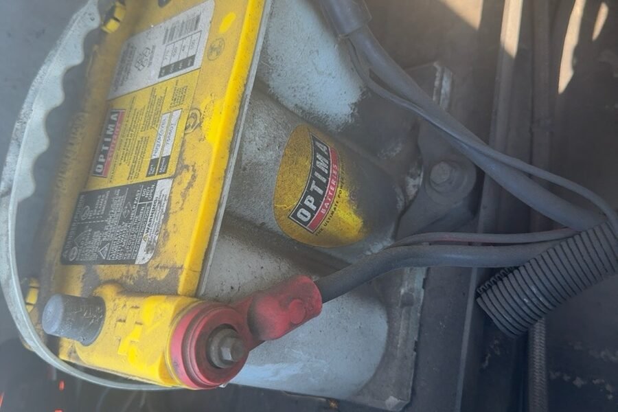 New battery installed in a vehicle during electrical service